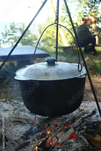cauldron on an open fire, cooking, camping