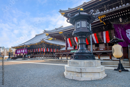 Kyoto, Japan - March 30 2023: Higashi Honganji temple situated at the center of Kyoto, one of two dominant sub-sects of Shin Buddhism in Japan and abroad photo