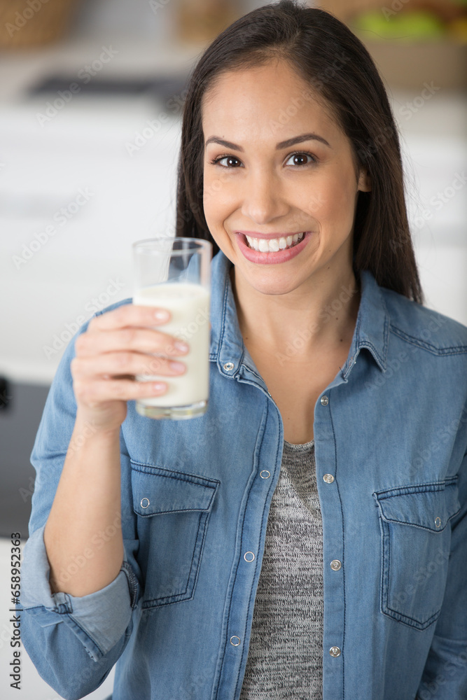 portrait of a pretty lovely girl drinking milk portrait of a pretty lovely girl drinking milk