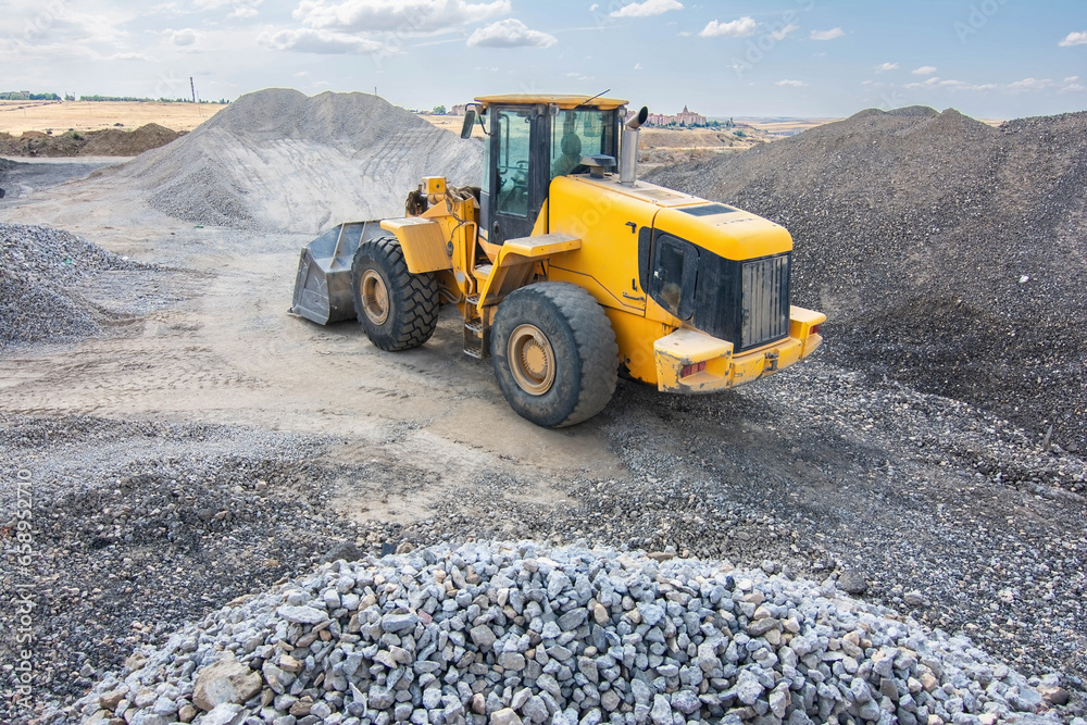 Excavator in a construction site, necessary machinery for the work