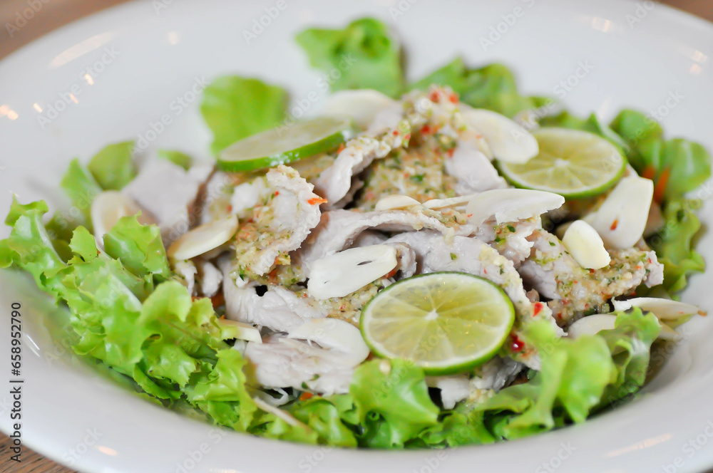 boiled pork salad, spicy pork salad with lettuce and lime or spicy salad boiled pork salad, spicy pork salad with lettuce and lime or spicy salad