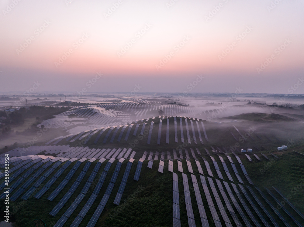 aerial view solar power station on mountain with sunrise aerial view solar power station on mountain with sunrise
