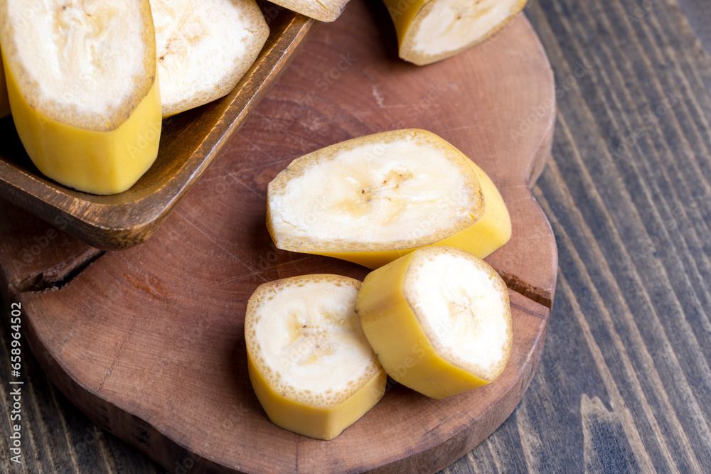 Sliced ripe yellow banana, close up Sliced ripe yellow banana, close up