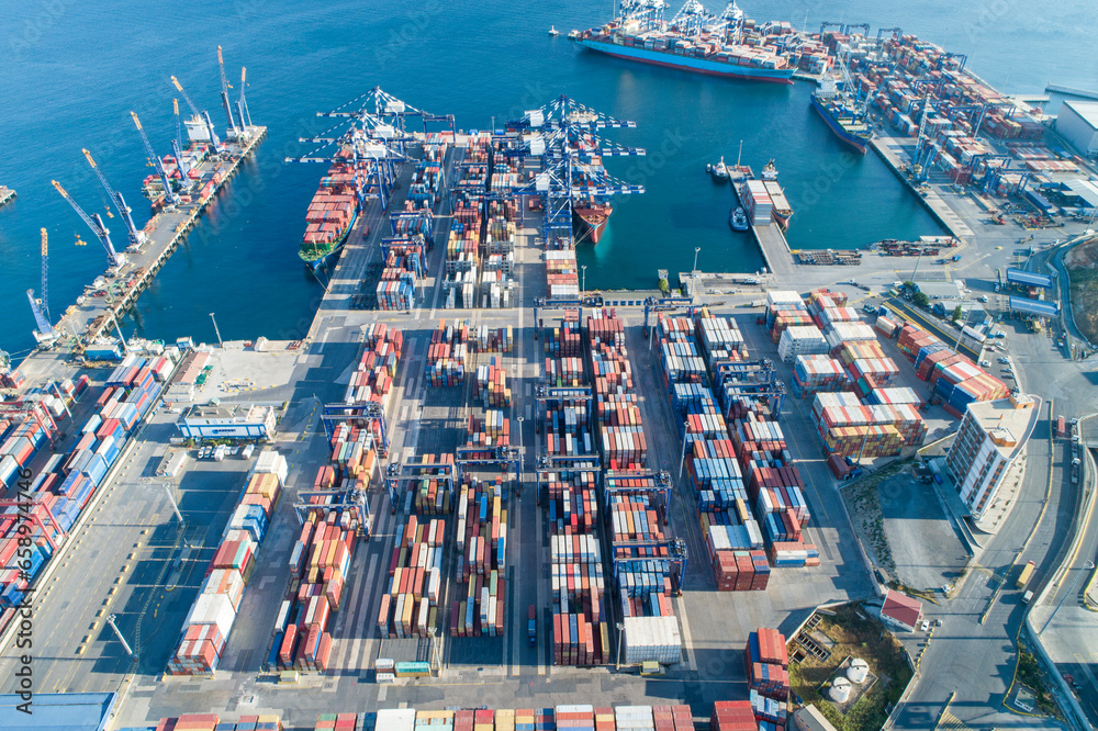 Obraz premium Container ship docked in port as seen from above