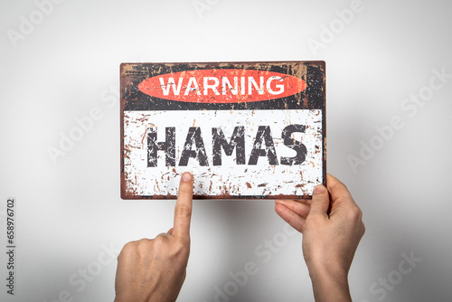 HAMAS. Warning sign with text on a white background