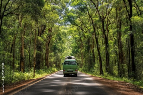 Driving camper van through forested road on Australian road trip. Generative AI