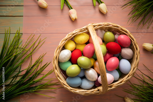 Fototapeta Naklejka Na Ścianę i Meble -  easter eggs in a basket