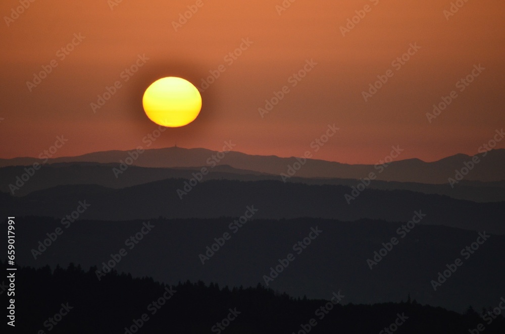 Sunset on the Schnebelhorn. Sun just before setting. Nice evening atmosphere. Zurich, Switzerland. High quality photo