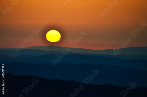 Sunset on the Schnebelhorn. Sun just before setting. Nice evening atmosphere. Zurich, Switzerland. High quality photo photo