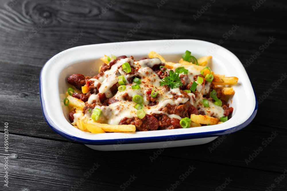 Chili Cheese Potato Fries topped with hot minced beef and cheese sauce Chili Cheese Potato Fries topped with hot minced beef and cheese sauce