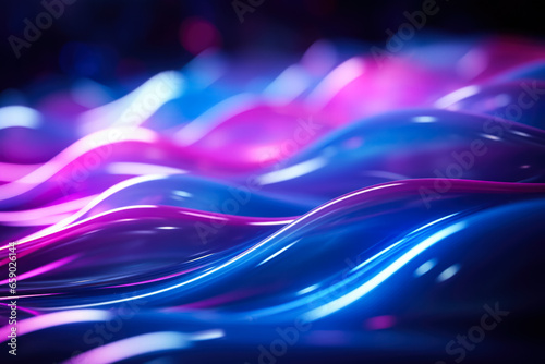 Abstract background features pink and blue glowing neon lines and bokeh lights 