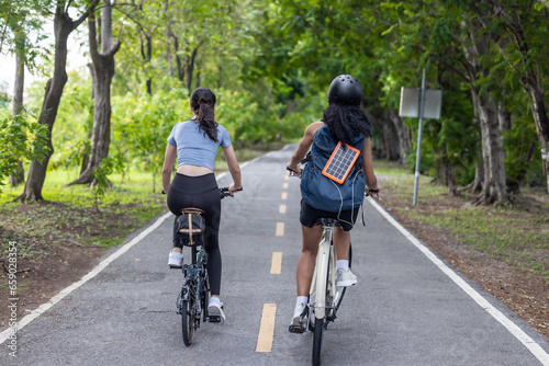 Wallpaper Mural Biker fuse eco-awareness, cycling for fitness, solar for device power, and recycling into lifestyle Torontodigital.ca
