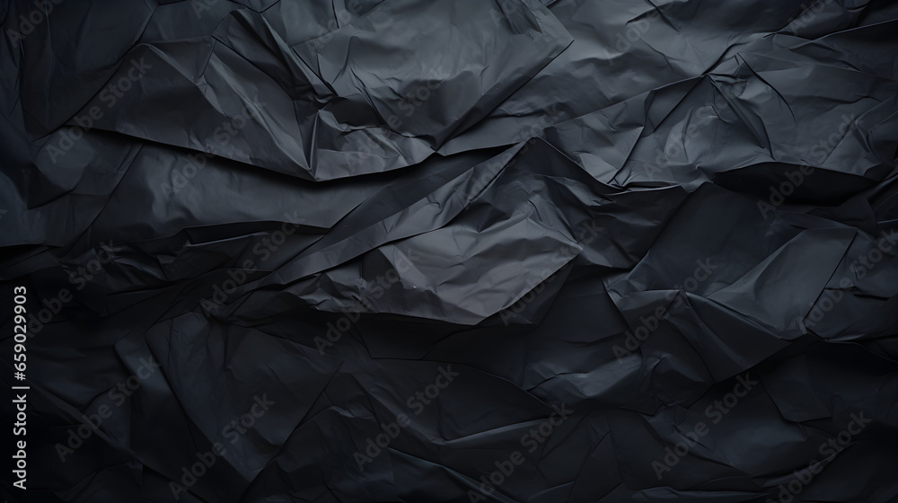 Black crumpled paper texture background Black crumpled paper texture background