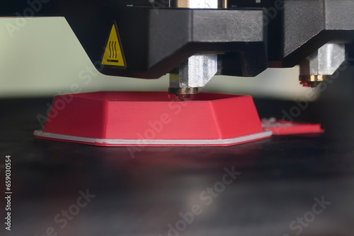 Fototapeta Naklejka Na Ścianę i Meble -  Close up scene the additive manufacturing by 3D printer machine.