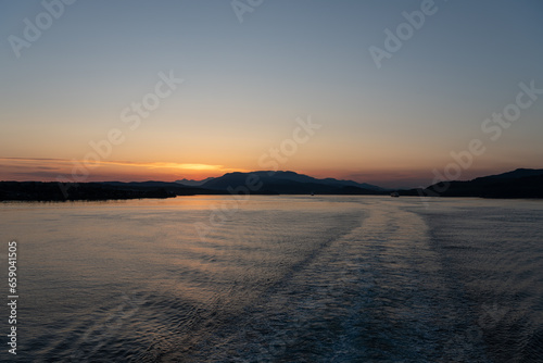 Sunset in the Johnstone Strait, inner passage, British Columbia, Canada. photo