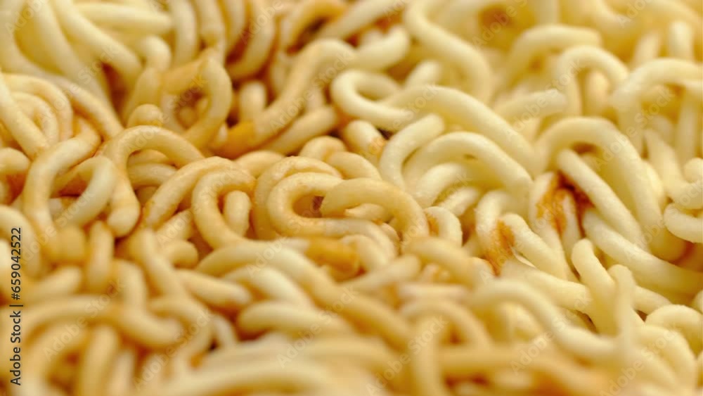 cooking instant noodle on metal plate in macro shot
cooking instant noodle on metal plate in macro shot