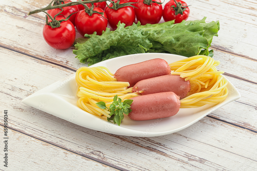 Mini sausages with pasta spaghetti Mini sausages with pasta spaghetti