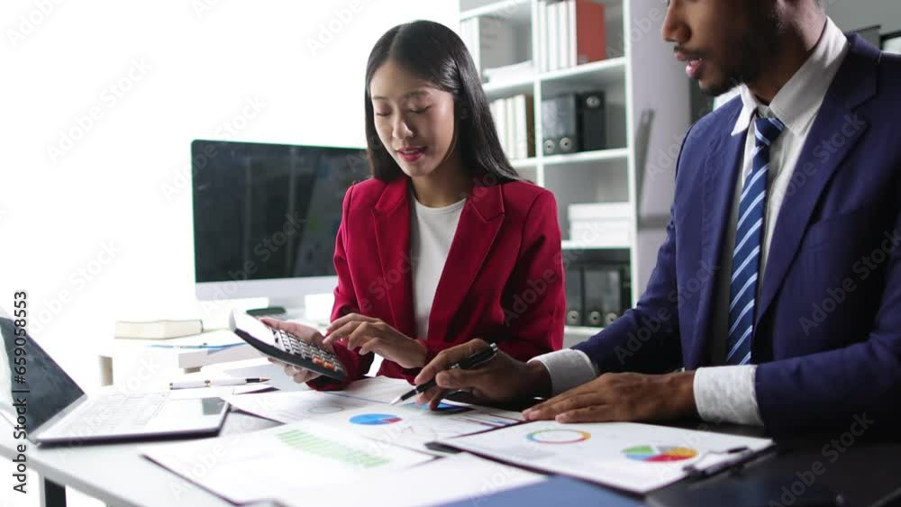 Business colleagues working in the office are analyzing strategies for business growth and making financial plans for investments. Business colleagues working in the office are analyzing strategies for business growth and making financial plans for investments.