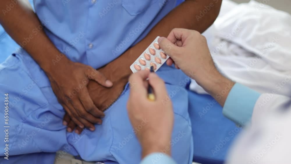 Doctor gives medication advice to a male patient with symptoms of sexual dysfunction, Male health problems. Health consultants and disease treatment from specialized doctors in the hospital. Doctor gives medication advice to a male patient with symptoms of sexual dysfunction, Male health problems. Health consultants and disease treatment from specialized doctors in the hospital.