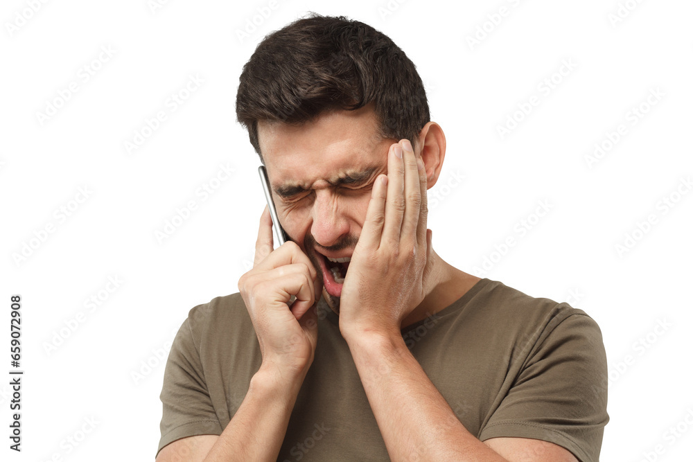 Boring phone call concept, young bored man yawning while having a conversation Boring phone call concept, young bored man yawning while having a conversation