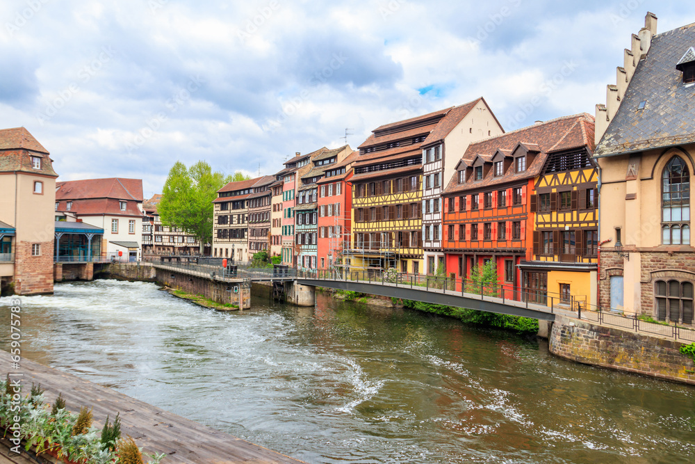 Traditional half-timbered houses on the canals district Petite France in Strasbourg, Alsace, France.  UNESCO World Heritage Site