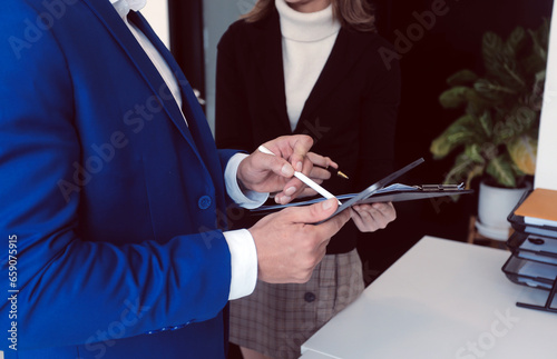 Business Documents, Auditor businesswoman checking searching document legal prepare paperwork or report for analysis TAX time,accountant Documents data contract partner deal in workplace office