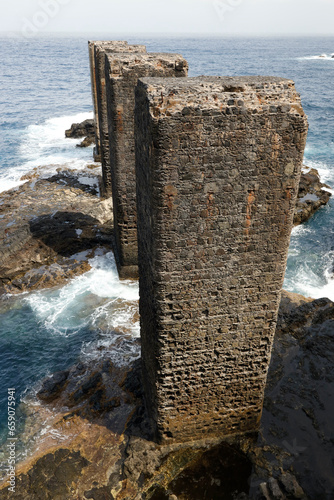 La Gomera, Spain. View of the dilapidated banana loading station in Hermigua, located on the Atlantic Ocean. photo