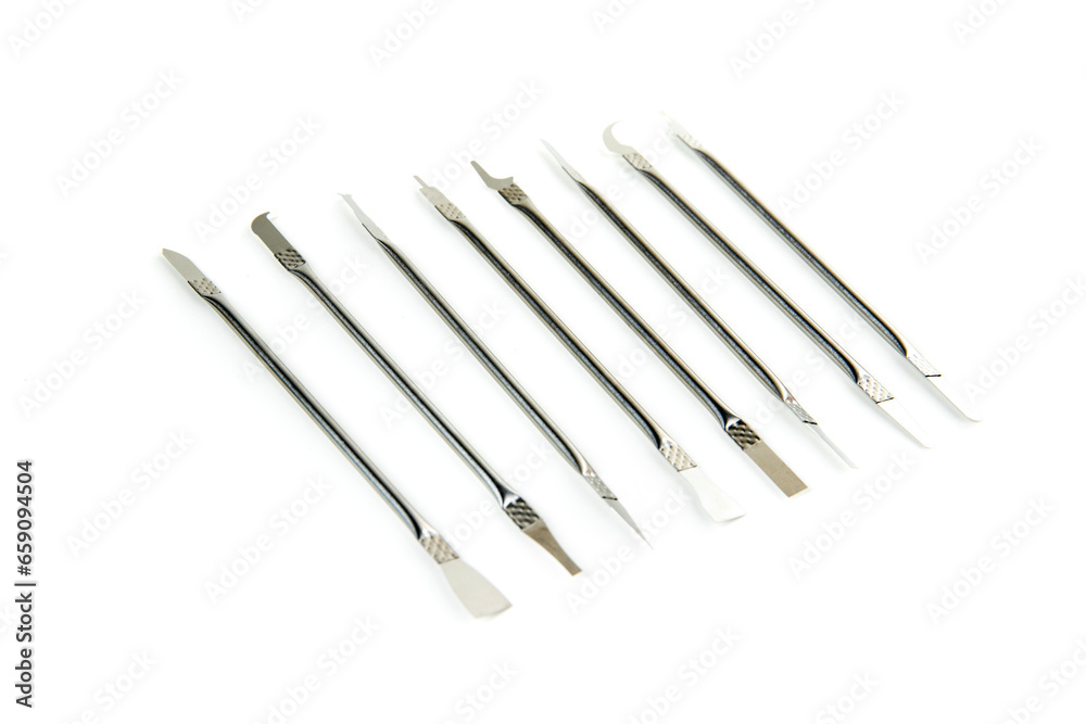 Silver computer repair tool kit with mutliple tips for lifting components Silver computer repair tool kit with mutliple tips for lifting components