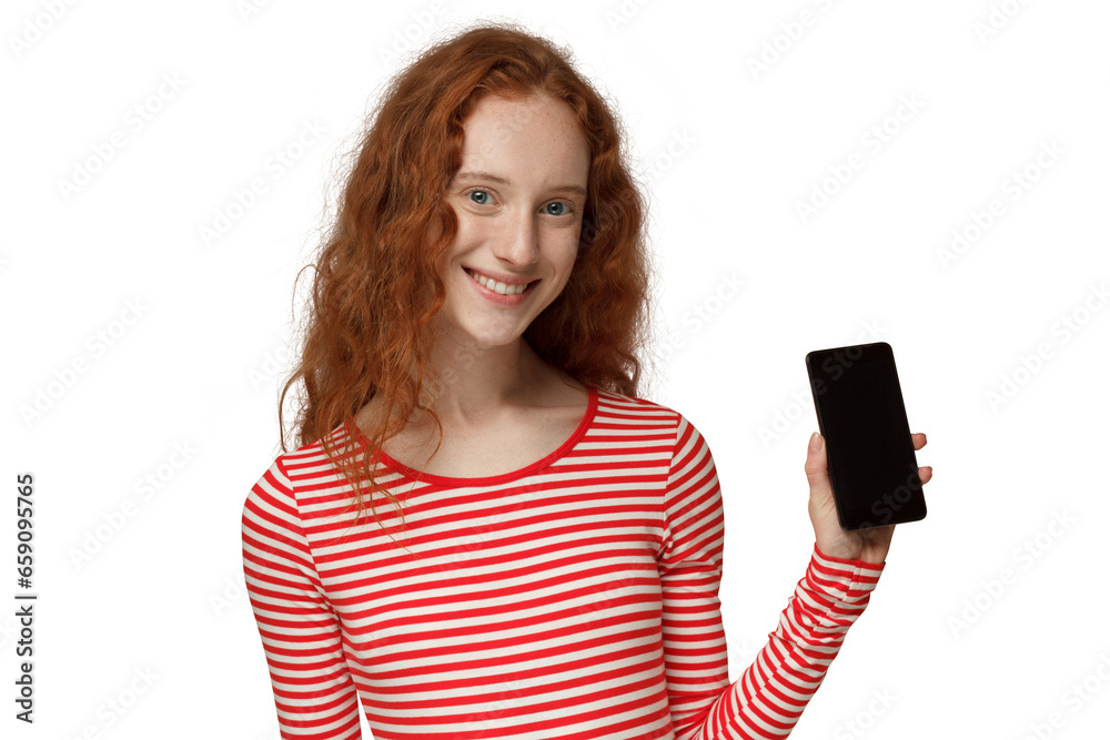Portrait of smiling to camera young redhead woman showing blank phone with black screen Portrait of smiling to camera young redhead woman showing blank phone with black screen
