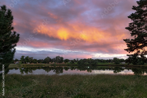 Greeley Colorado sunset over Centennial park.   photo