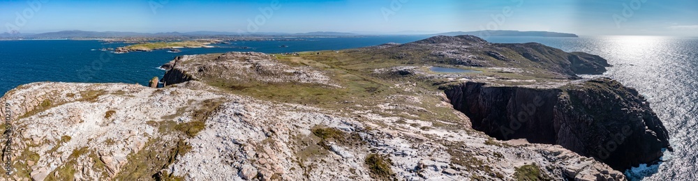 Aerial view of cliffs and sea stacks on Owey Island, County Donegal, Ireland Aerial view of cliffs and sea stacks on Owey Island, County Donegal, Ireland