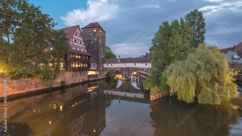Nuremberg (Nürnberg) Germany time lapse 4K, city skyline day to night timelapse at Wasserturm and Pegnitz River view from Max Bridge