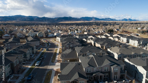 Arvada Colorado winter 2020 aerial view of housing development with mountains. 