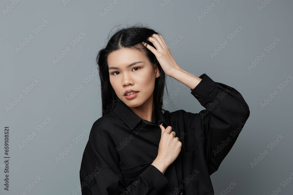 Woman grey portrait background face healthy fashion girl beauty skin asian smile Woman grey portrait background face healthy fashion girl beauty skin asian smile