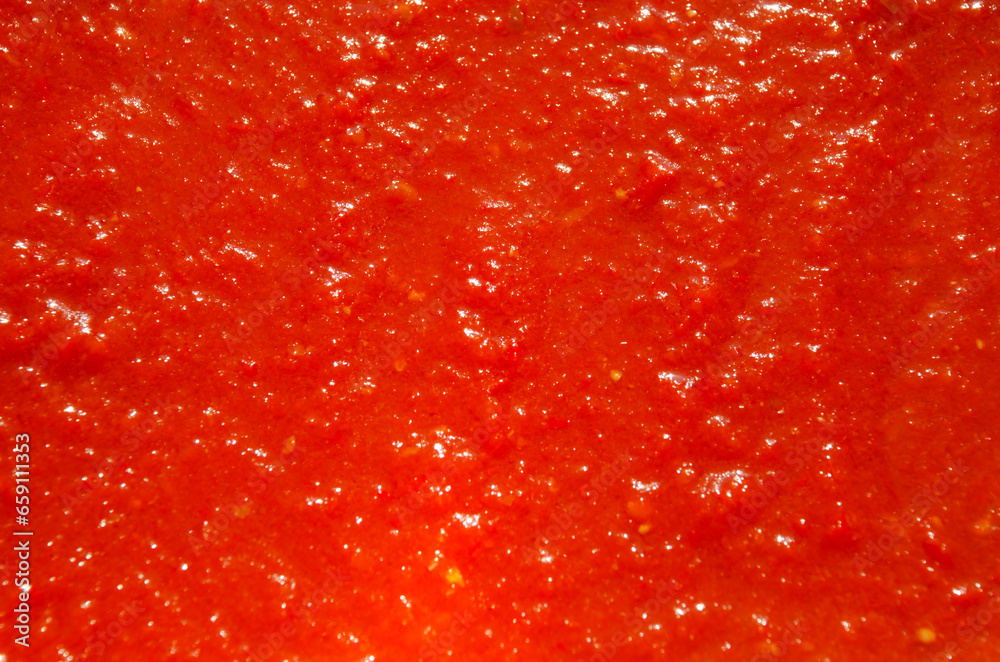 Texture of delicious adjika sauce as a background, close-up. Texture of delicious adjika sauce as a background, close-up.