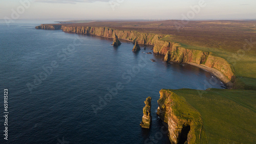 Beautiful rock stacks and stunning landscape of Scotland. Duncansby head are lying near John o Groats and it is a northern east of United Kingdom. This place is home for seals and thousands of seagull photo