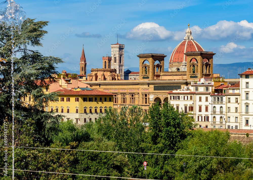 Florence cathedral (Duomo) over city center and Arno embankment, Italy
