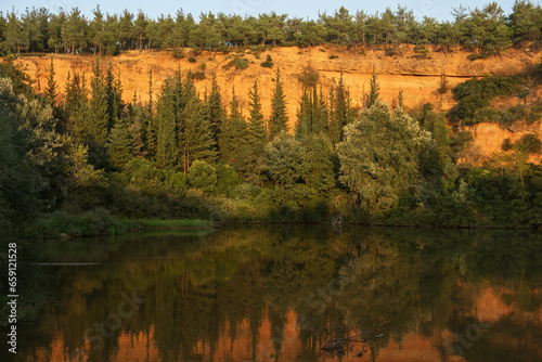 Beautiful autumn scenery. Scenic evening view of Lake and autumn forest. Colorful autumn scene of Greece, Europe. Beauty of nature concept background photo