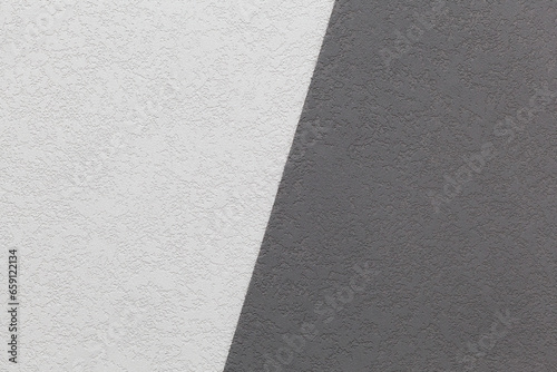 Natural texture of decorative plaster. Rough dark and light surface. Empty background