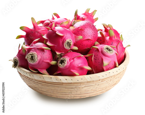 whole dragon fruit in wicker bowl, isolated