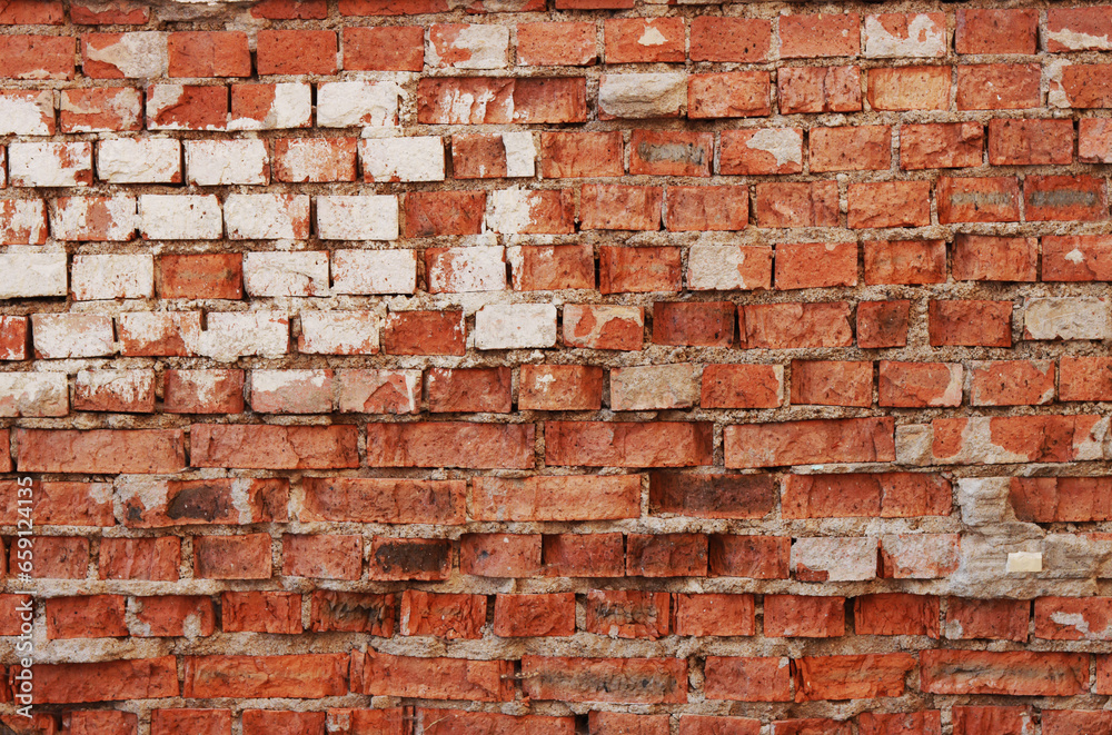 Naklejka premium Abstract background of time damaged brick wall.