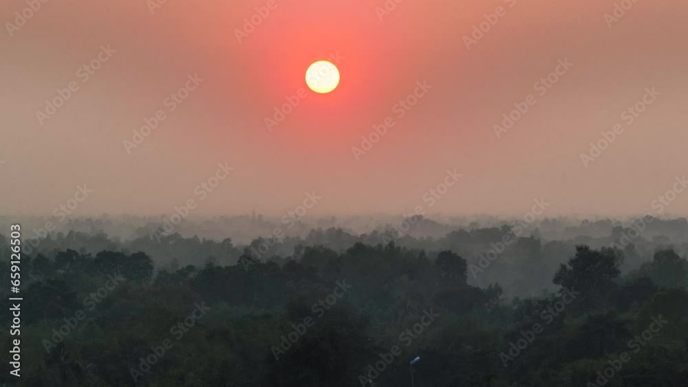 The sun dips below the horizon, casting a fiery glow across the sky. It is a moment of peace and tranquility, as the world bids farewell to another day. Sunset, Dusk, Aerial, Drone The sun dips below the horizon, casting a fiery glow across the sky. It is a moment of peace and tranquility, as the world bids farewell to another day. Sunset, Dusk, Aerial, Drone
