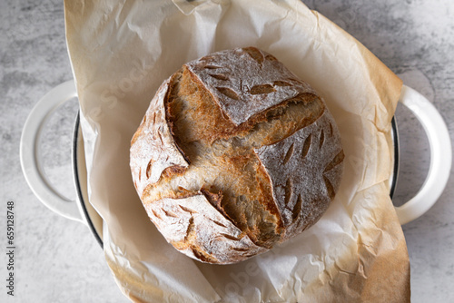top view of sourdough bread loaf . home baker and baking concept.