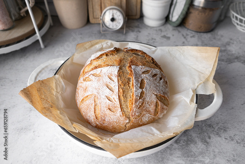 The sourdough bread or artisan bread in the Dutch oven pan. Healthy breakfast bread. Natural yeast fermentation for bakery and baking pastry.