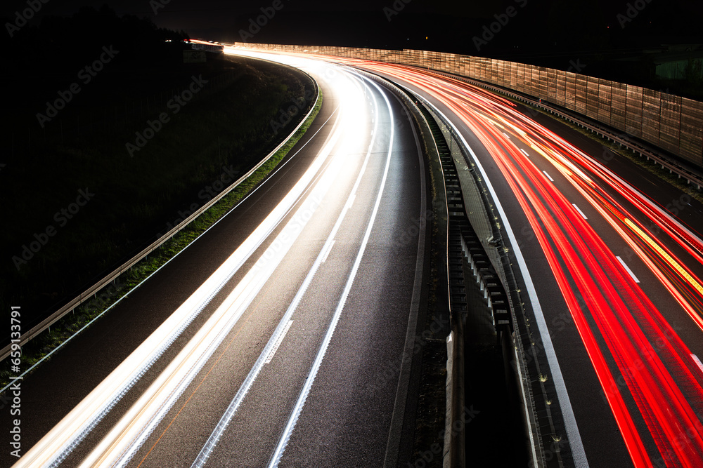 Traffic in motion blur. Traffic on highway at night.