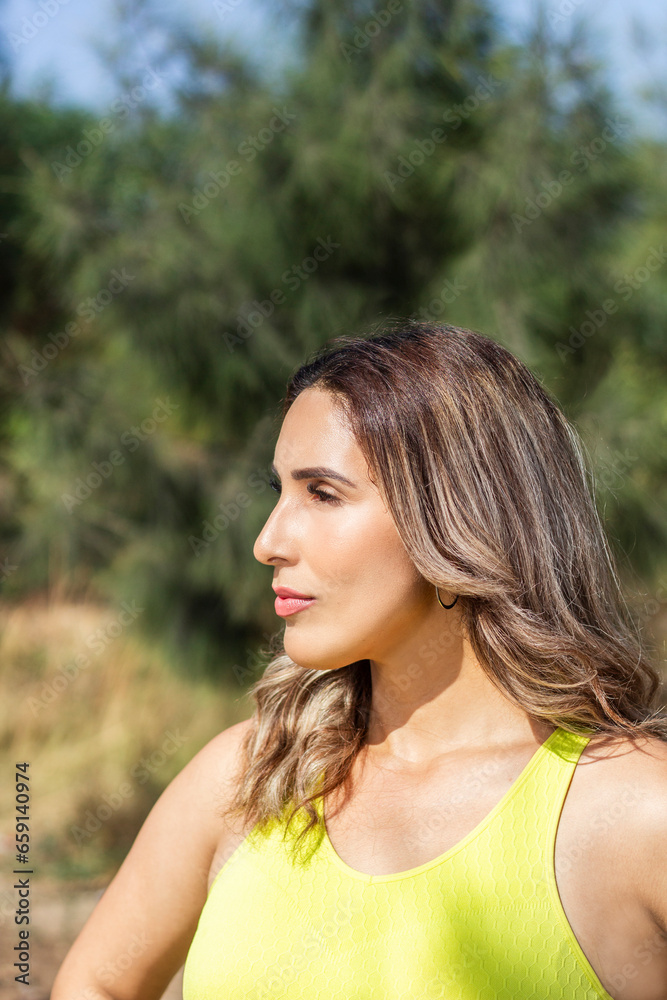 portrait of latin sporty woman in confident pose and inspiring look portrait of latin sporty woman in confident pose and inspiring look