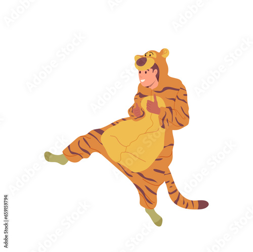 Happy overjoyed teen boy cartoon character wearing tiger kigurumi pajamas costume isolated on white