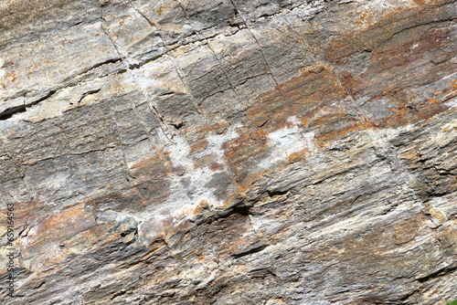 Stone background. Rock texture. Orthogneiss and gneiss rock.