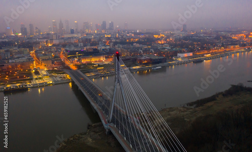 Aerial view on the Swietokrzyski bridge over the Vistula river. Warsaw, Poland. High quality photo