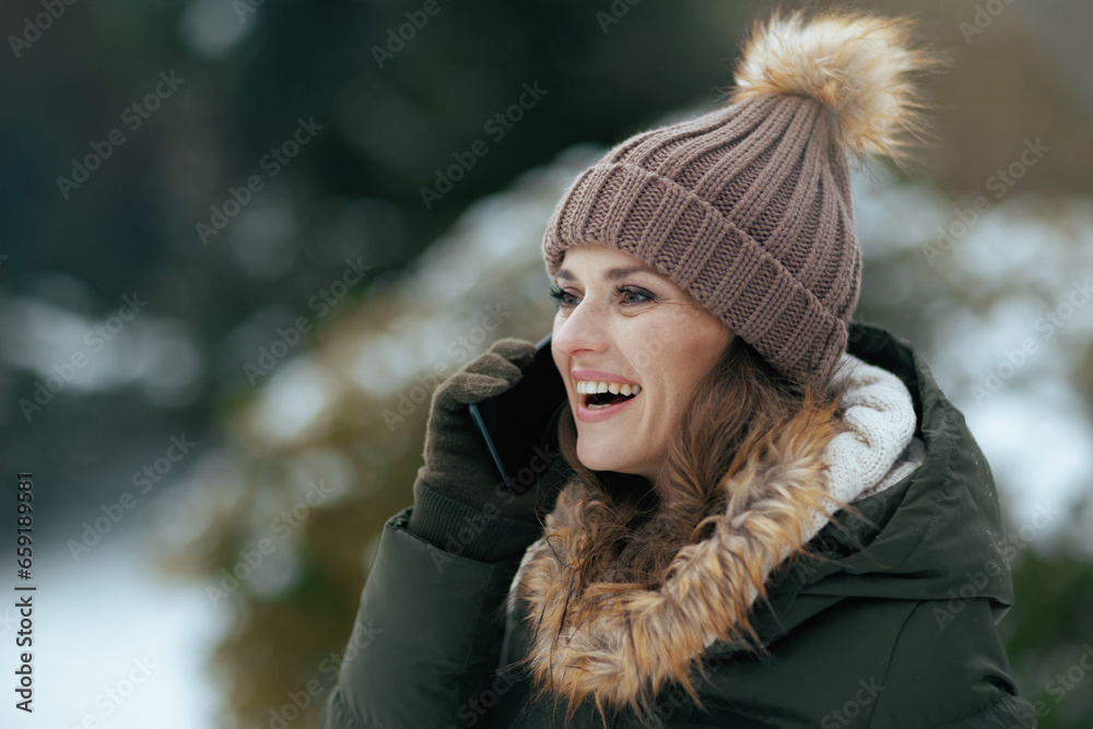happy modern female outdoors in city park in winter happy modern female outdoors in city park in winter